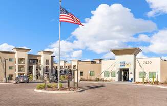 The building number 7430 is visible on the side of the building.