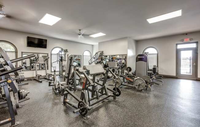 a fitness center with cardio equipment and exercise machines