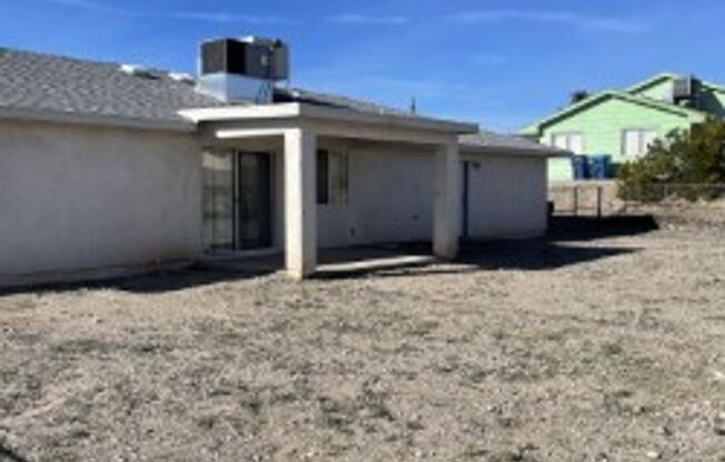 North side home, pet friendly with fenced back yard.