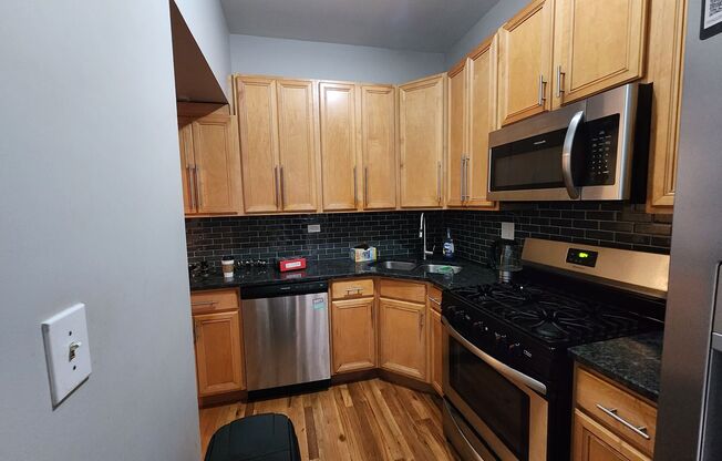 Across the street from UofC campus! Super spacious modern duplex down!