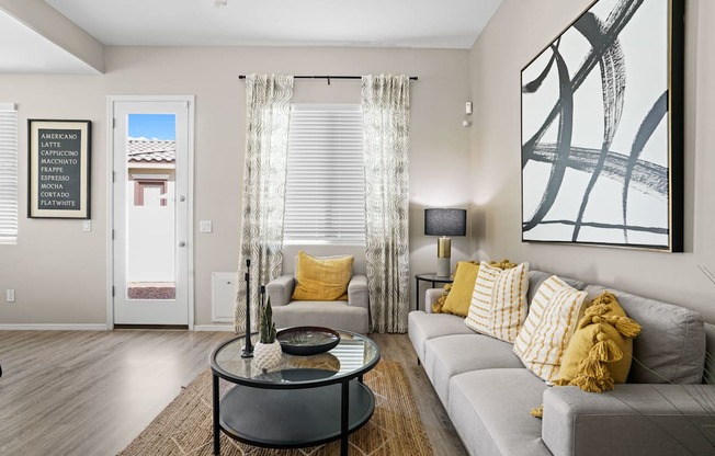 a living room with a couch and a coffee table