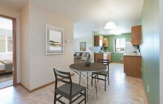 Kitchen with Green Walls at Sunset Ridge Apartments in Bismarck, ND