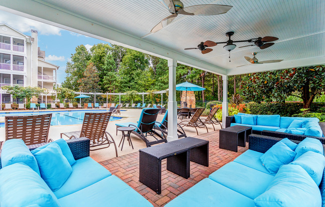 View of Pool Area, Showing Cabana, Outdoor Furniture, and Loungers at Summer Park Apartments