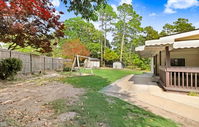 SPACIOUS Brick Home in Goldsboro w/ HUGE Covered Porch & Fenced-in Yard
