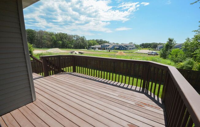 Enjoy the beauty of summer on the deck of this amazing home!