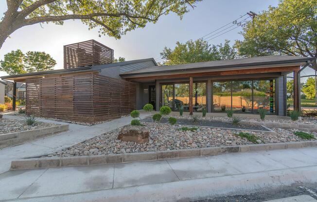 a house with trees in the background