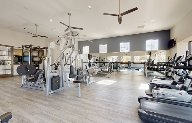 Elevate your fitness routine in this contemporary gym filled with top-of-the-line equipment.
