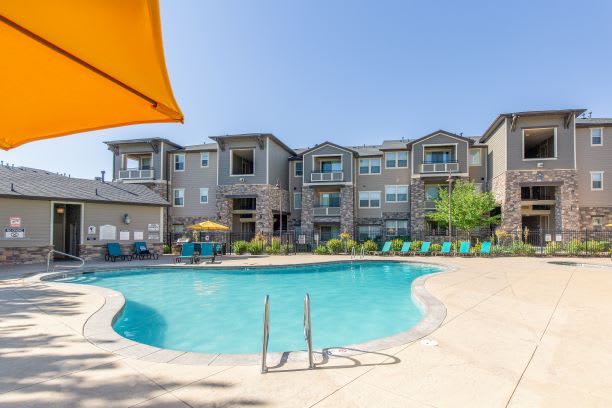 Swimming Pool And Relaxing Area at San Tropez Apartments & Townhomes, Utah, 84095