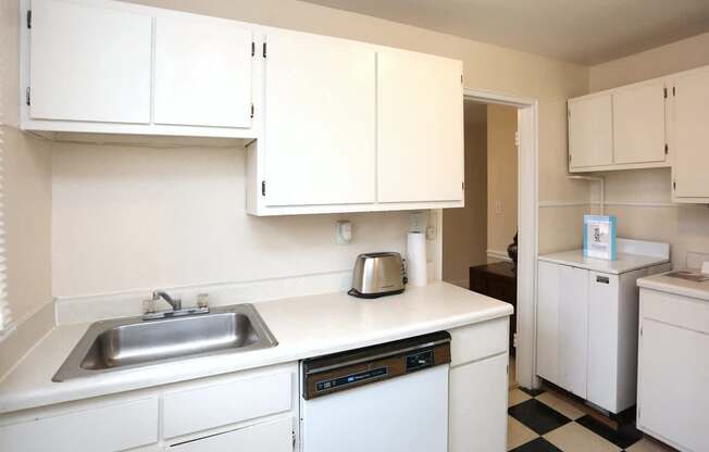 View of kitchen model with sink and dishwasher