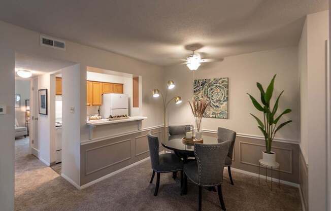 This is a photo of the dining area from the living room in the 822 square foot, 2 bedroom, 1 bath floor plan at Village East Apartments in Franklin, OH.