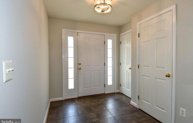 Beautifully updated townhome with an attached one-car garage.