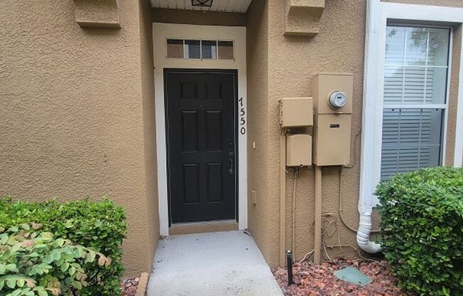 Beautiful 2-Story 3 Bedroom/2.5 Bathroom Townhome with a 2 Car Garage in a Gated Community- Water/Sewer, Trash and Lawn Included!!