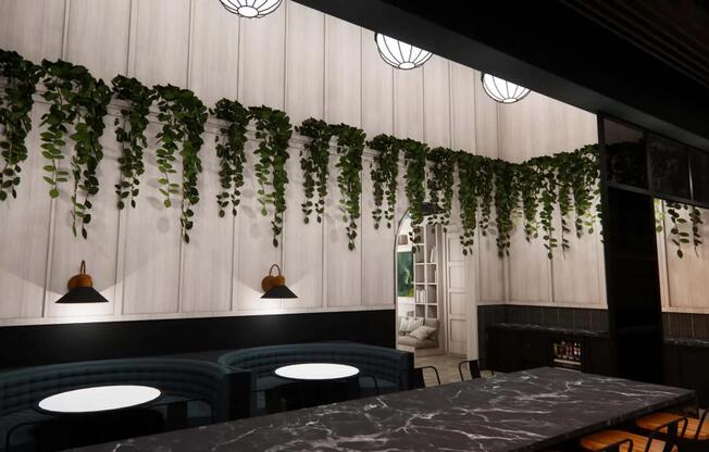 Rooftop deck with indoor/outdoor patio and lounge seating.