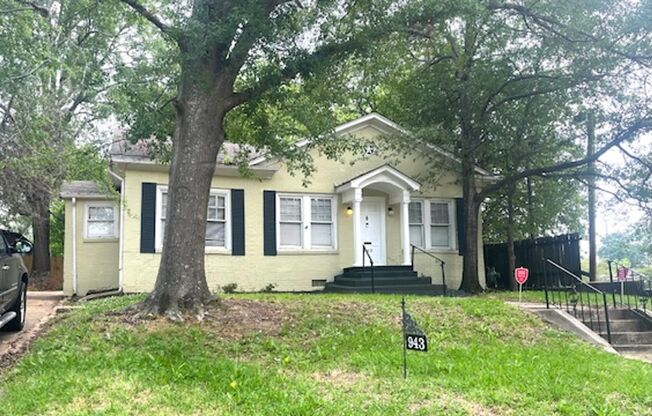 This cute, but large cottage is located in the historic Belhaven neighborhood