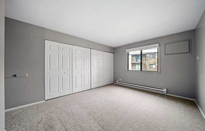 spacious bedroom with large closets