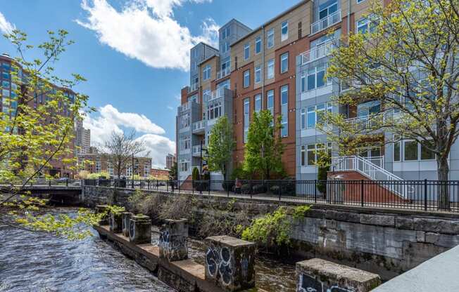 a view of a river with a building in the background