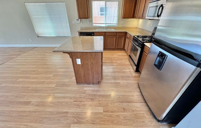 LOVELY 4 BEDROOM, 3 BATHROOM HOME LOCATED IN A BEAUTIFUL AND WELL-MAINTAINED COMMUNITY.