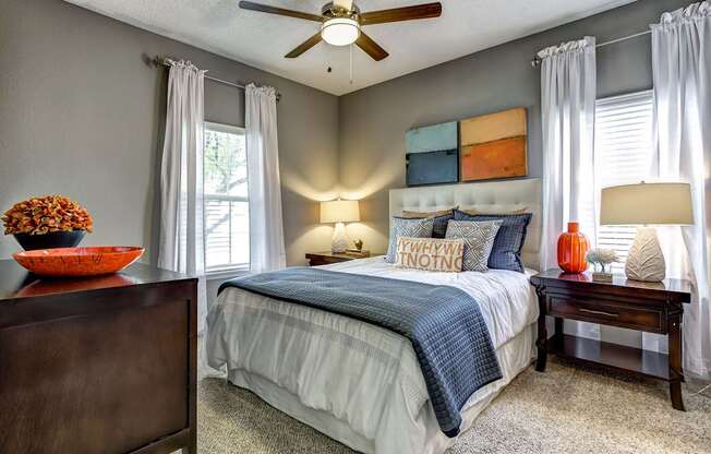 Upgraded model bedroom with 9 foot ceilings and ceiling fan