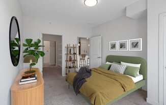 a bedroom with a green bed and a brown blanket