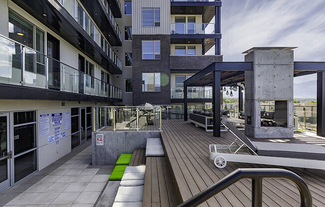 lounge chairs on a patio at Lotus Republic Apartments for rent in Downtown Salt Lake City, Utah