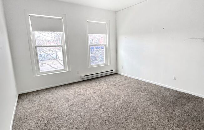 Top Floor Apartment in Historic Building on Main St.
