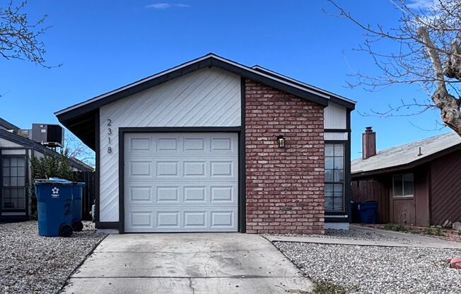 Fantastic 4 bedroom home with a 1 car garage and driveway space for additional car! Backyard and updated home!