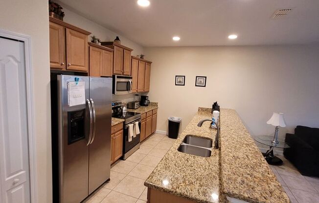 Fully Furnished 4 bed 3 bath with Pool in beautiful community Paradise palms
