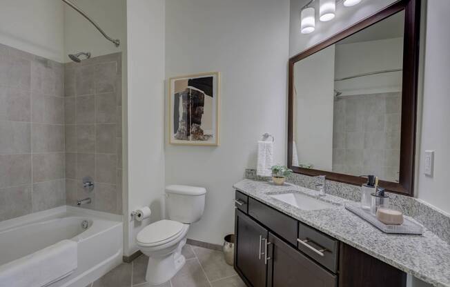 Bathroom With Vanity Lights at The Lincoln Apartments, Raleigh, 27601