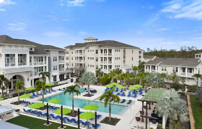 an aerial view of the pool at the resort at longboat key club