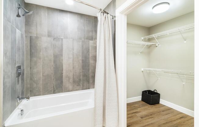 A clean, well-designed bathroom at Modera McGavock, featuring modern finishes and generous storage, conveniently located near Nashville’s dining and music scene.