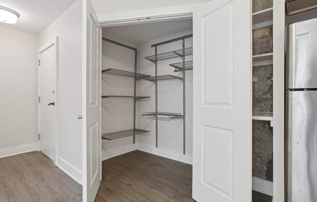 a walk in closet in a 555 waverly unit