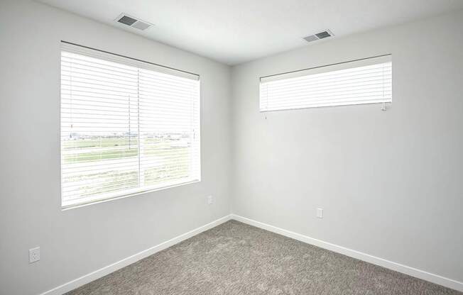 Studio, one two and three bedroom apartments and townhomes featuring open concept floor plans, dens, large windows, stainless steel appliances, quartz countertops, eat-in kitchens, pantries, LVT flooring and much more at The Trails at North Streams in Omaha, NE