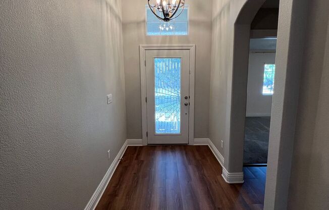 Gated Single Story Home with 3 car garage and upgrades galore!