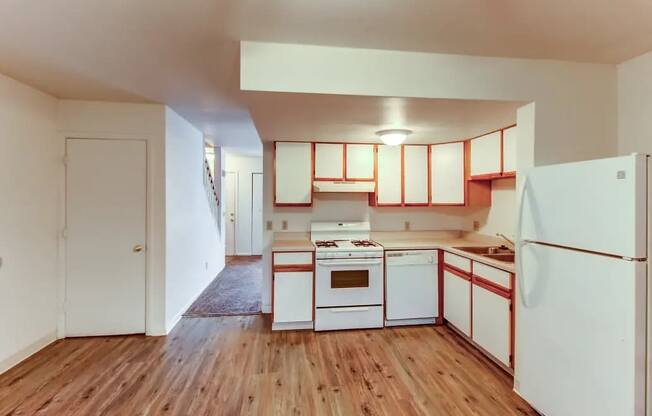 Large kitchen with fridge and dishwasher at Arbor Pointe Townhomes, Battle Creek, Michigan