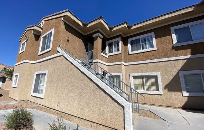 STUNNING 3 BEDROOM 2 BATH SECOND FLOOR CONDO IN GATED COMMUNITY