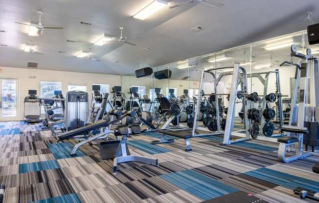 Fitness center with weights and treadmills