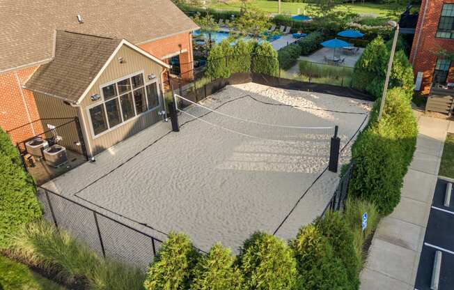 an aerial view of a backyard with a tennis court at Hayden Lofts, Dublin, 43016