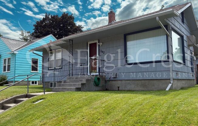 Three Bedroom, Two Bathroom House with Fenced Yard and Outdoor Fireplace