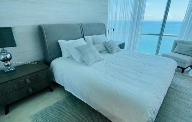 Breathtaking views from this fully furnished 2-bedroom + den residence for rent
