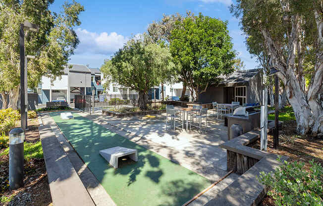 Outdoor Corn Hole Area at Colonnade at Fletcher Hills Apartments in El Cajon, CA.