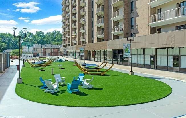 Relax in the plaza - bistro seating and hammocks galore at Trillium Apartments, Fairfax, 22031