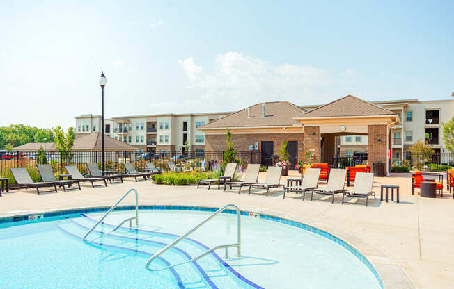 our apartments offer a swimming pool with chaise lounge chairs