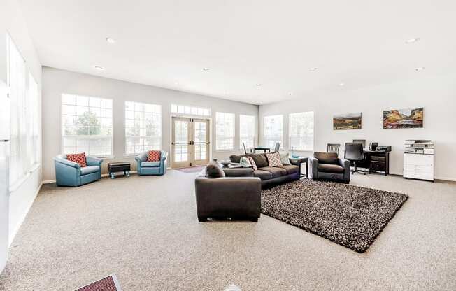 Clubhouse Lounge with Armchairs and Desk with Chair