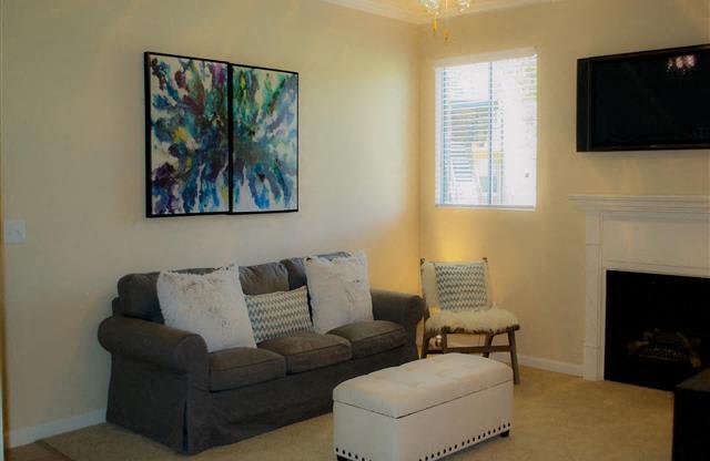 Furnished Living Room with Fireplace Apt rentals in Elk Grove l Siena Villas