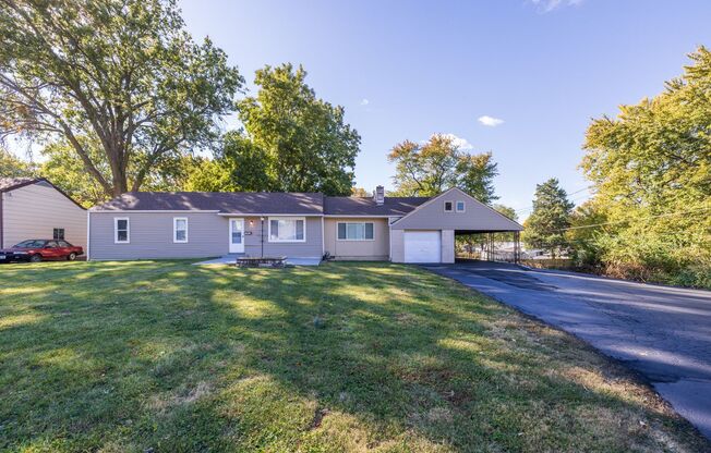 Spacious St. Ann Home with Large Detached Garage - Presented By Tiffany Gerling's Team
