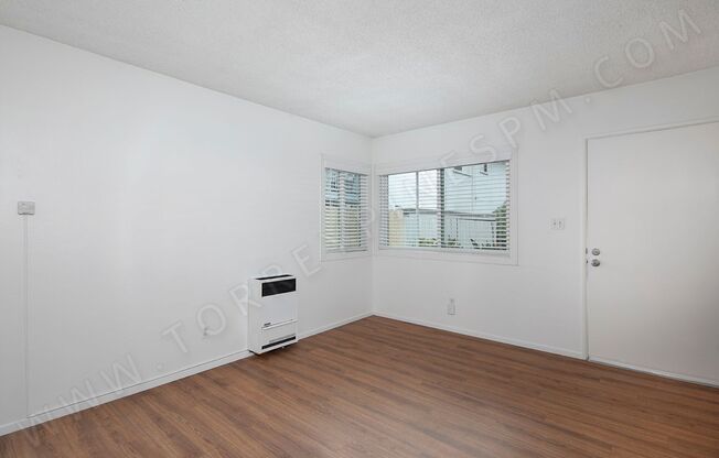 Spacious 1 Bedroom with Parking | Just One Block From Sail Bay!