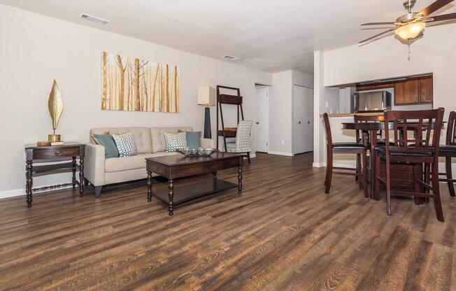 a living room filled with furniture on top of a wooden chair