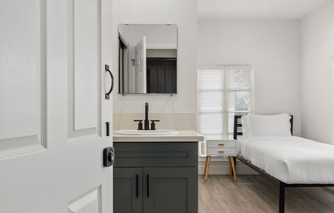 A 5 bedroom, 3 bathroom apartment with common areas and a fully functional kitchen at 1738 Kelton Ave.