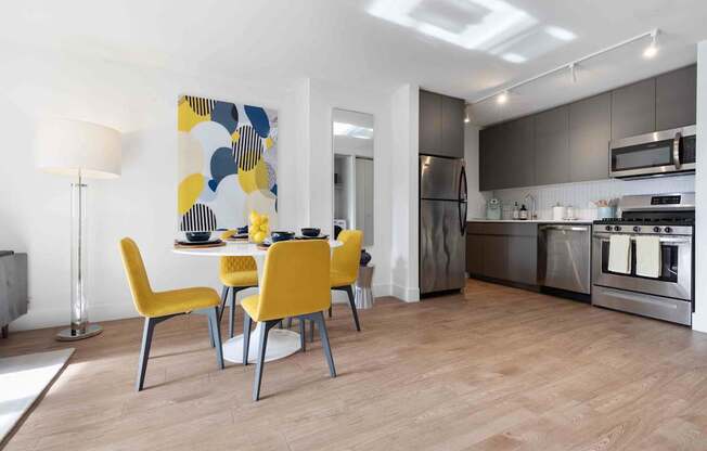 Lacquered matte cabinetry and  stainless steel appliances