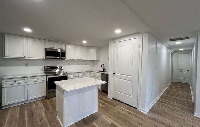 Modern 2BD*, 2BA with 3rd Bonus Room Near Downtown Durham with Assigned Off-Street Parking and Backyard